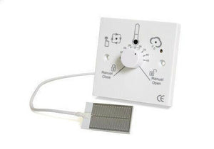 white panel with turning knob and attracted wire